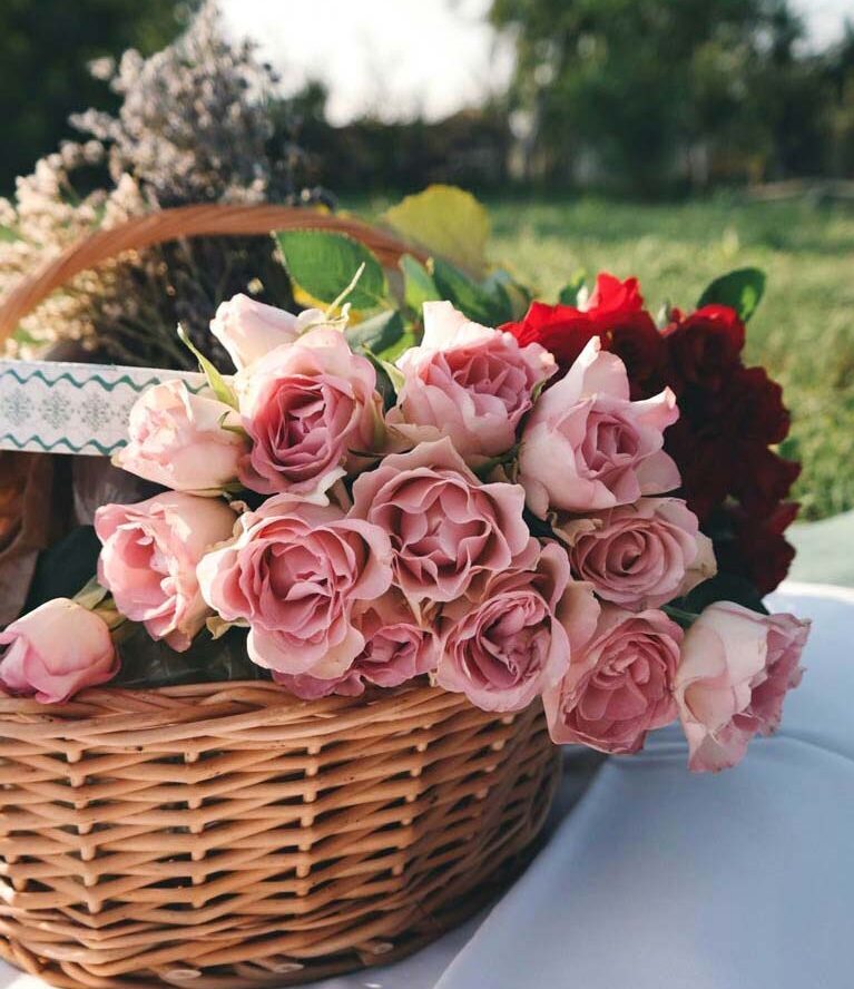 Roses and Flowers in wicker basket